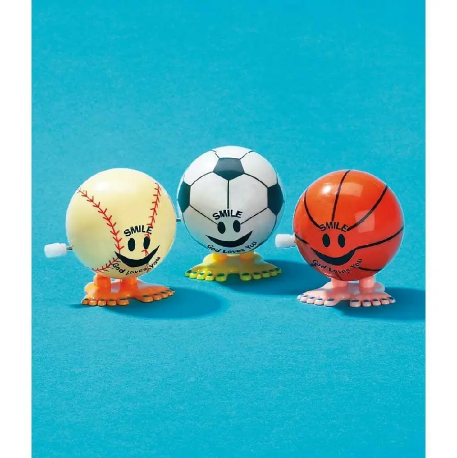 Wind up balls Smile God loves you ass
